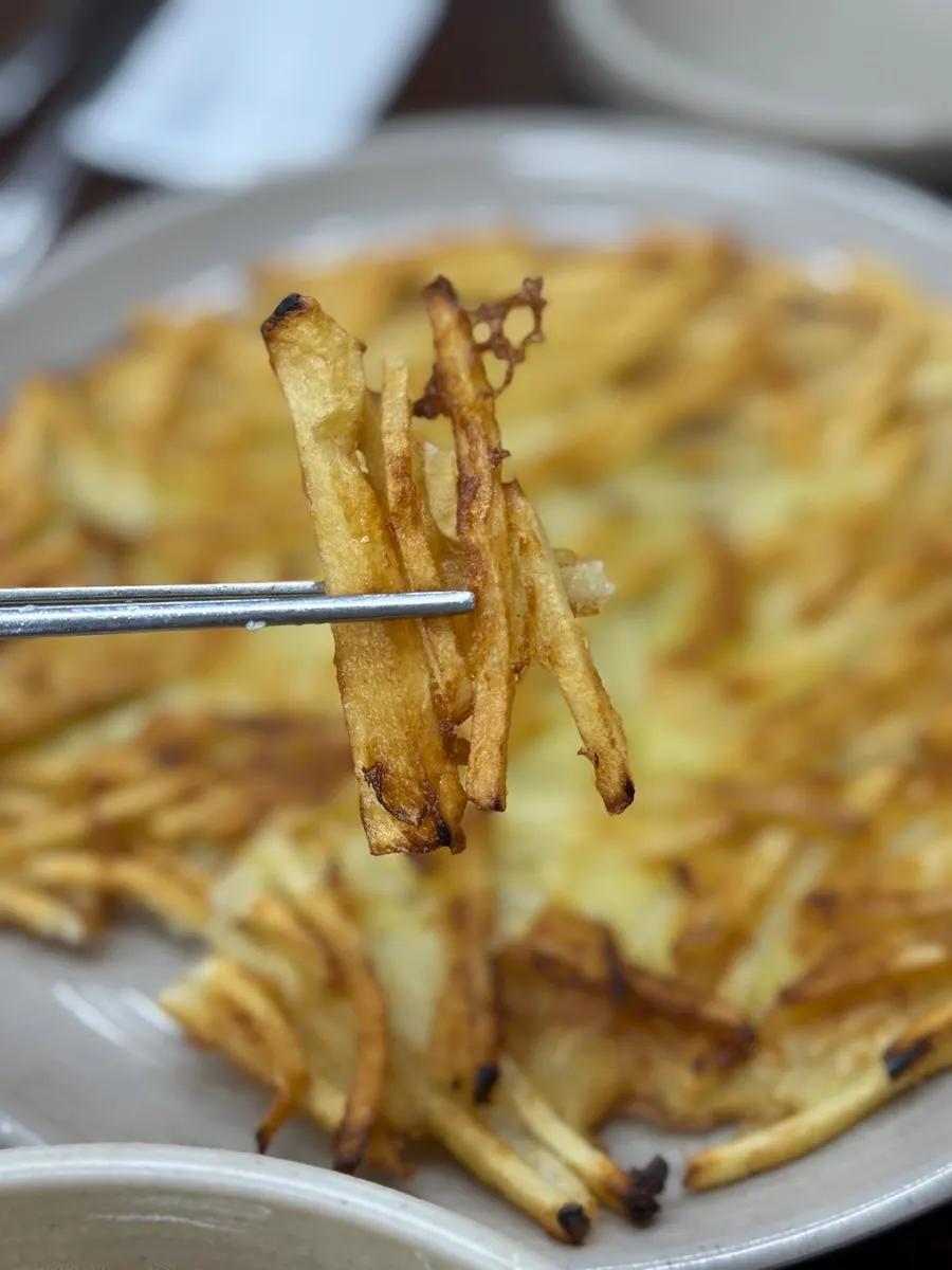 Cross-section of the crispy-outside, tender-inside potato pancake