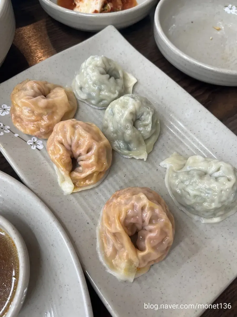 Roe-and-milt kalguksu portioned into a small serving plate