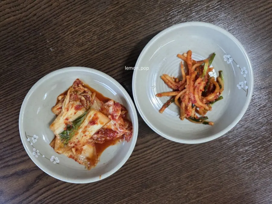 Todamok's side dishes including napa cabbage kimchi
