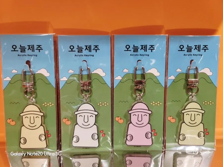 Dol hareubang acrylic keyrings displayed by color