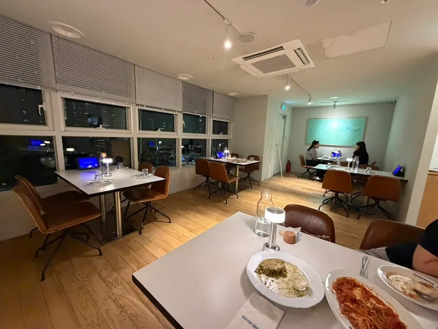 Warmly lit dining hall at Two Find Peter Incheon Nonhyeon Branch
