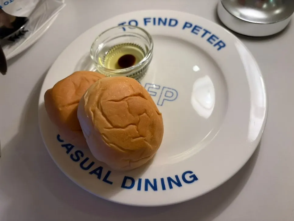 Plate of pre-meal bread and pickles