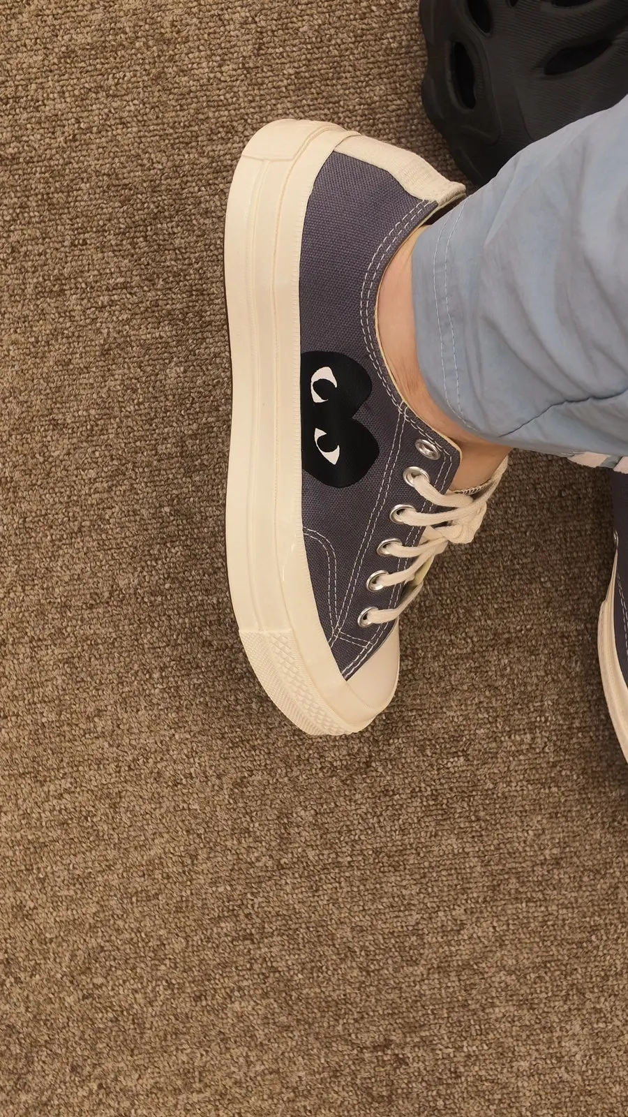 Comme des Garçons Converse displayed at a discounted price