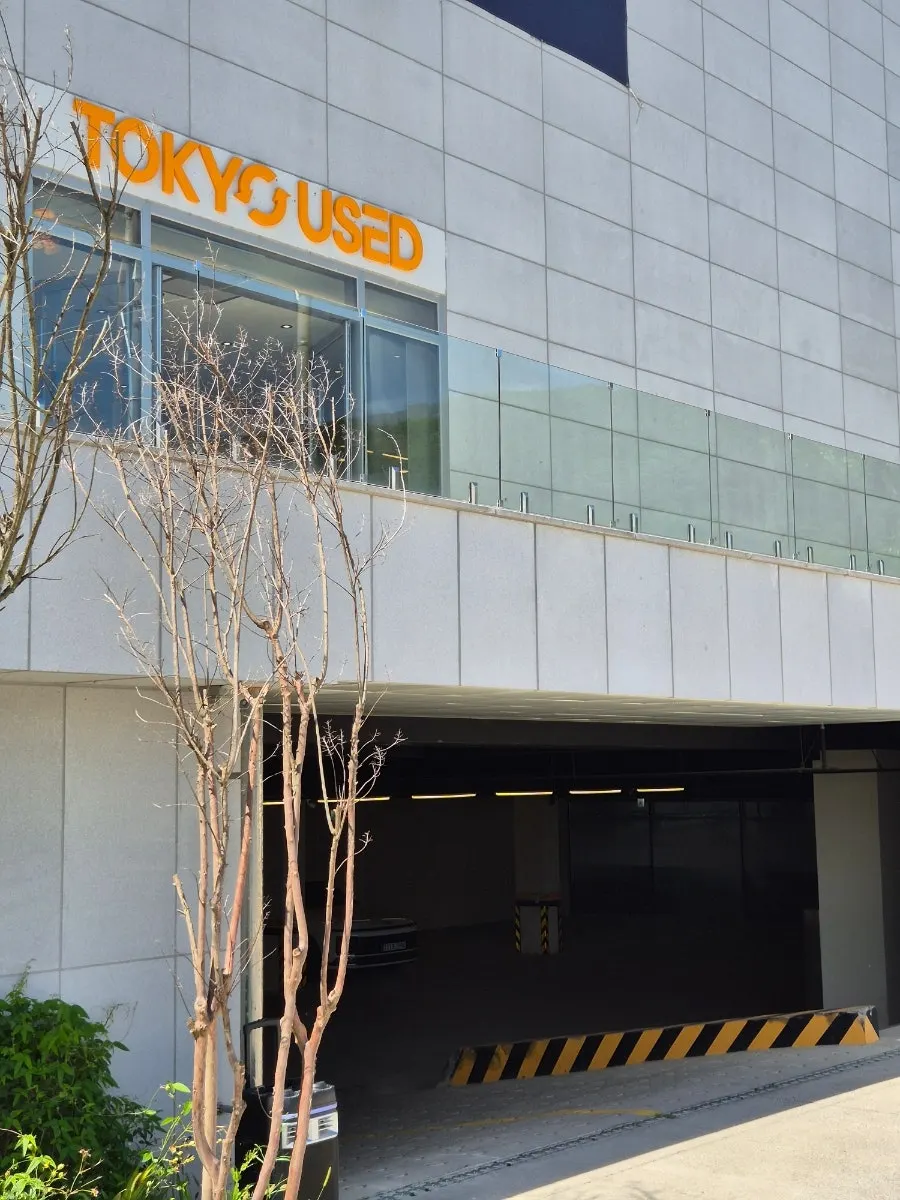 Store entrance with the TOKYO USED sign visible