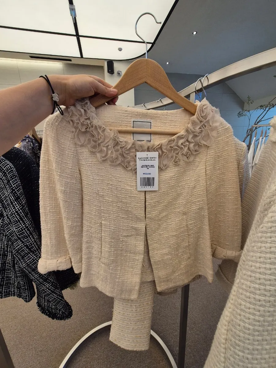 Hangers with cardigans and jackets