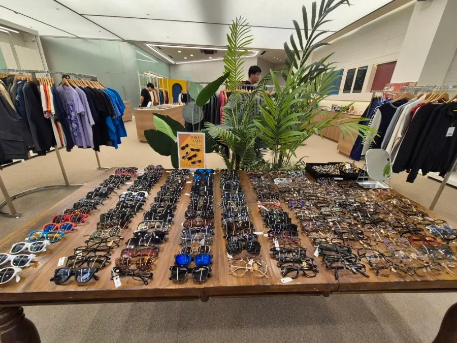 Clothing section with tweed jackets, shirts, and denim