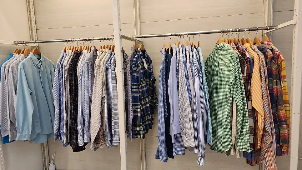 Polo-style shirts arranged by color