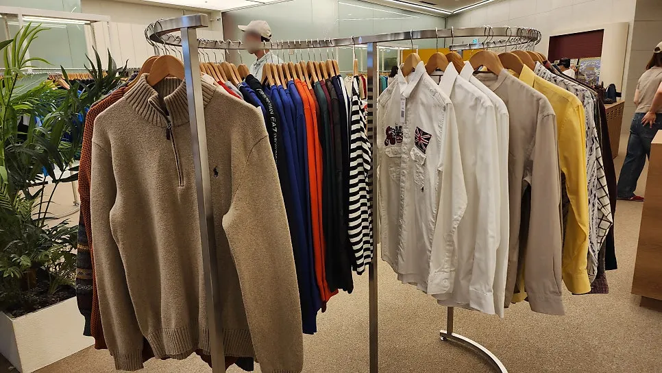 Secondhand clothing displayed on the first floor of TOKYO USED