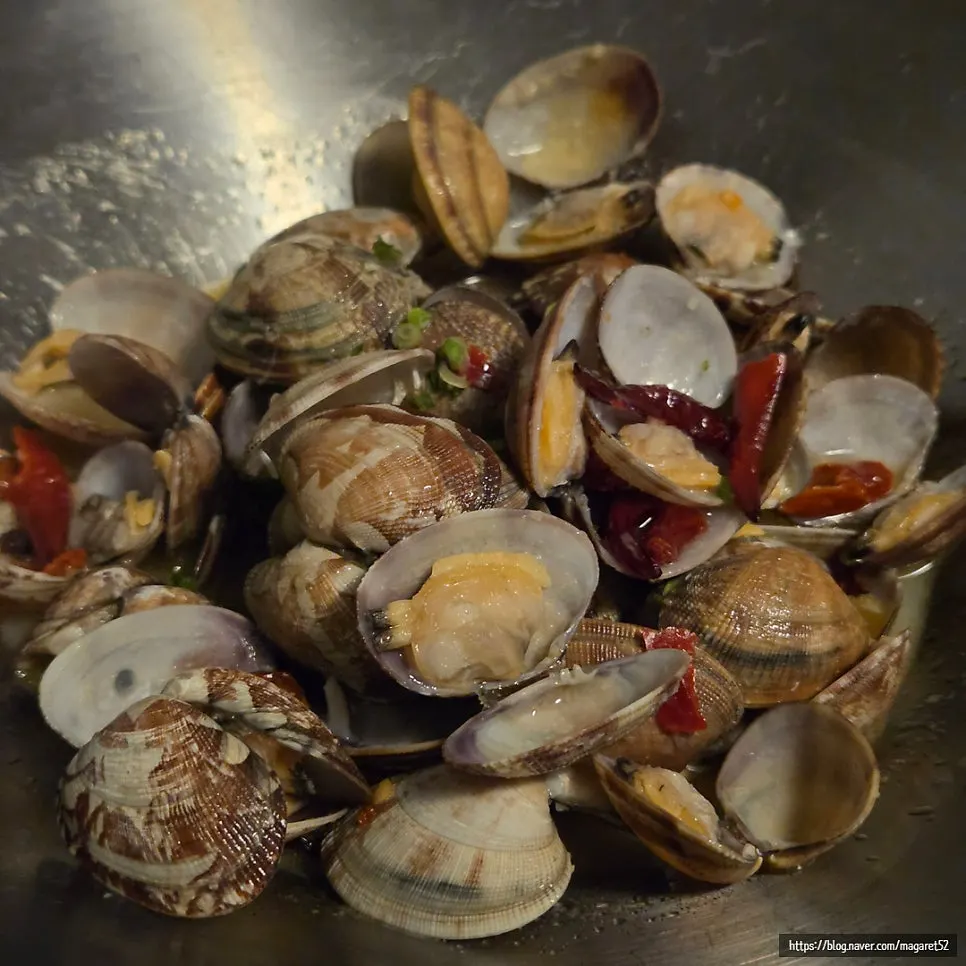 Broth from the clam butter sujjim, full of clams