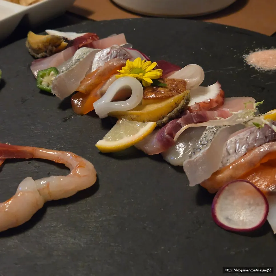 Tomo's 12-kind premium sashimi for two, plated