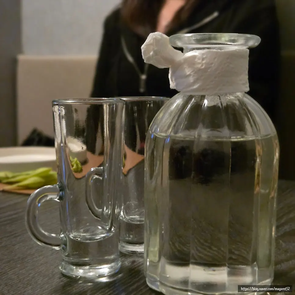 A glass of sake enjoyed alongside the sashimi