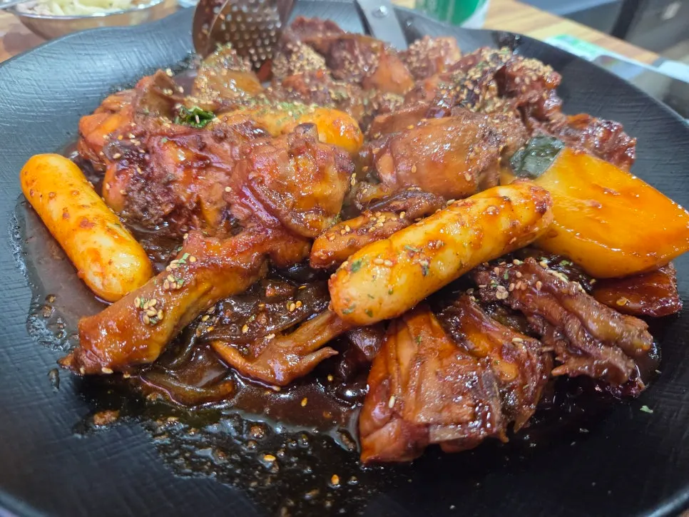 Whole gochu jjimdak with rice cake sticks