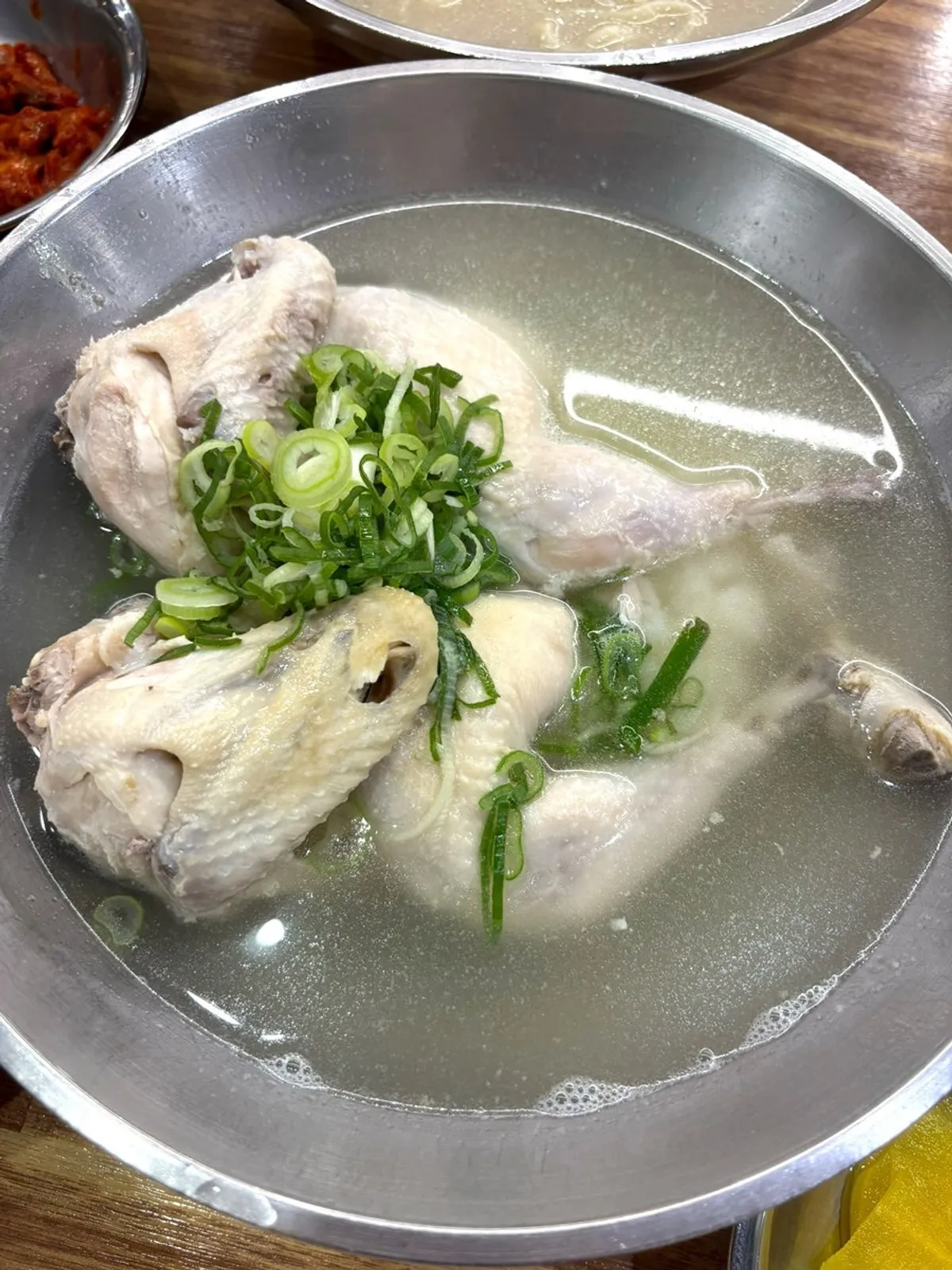Perilla chicken kalguksu with a whole half chicken