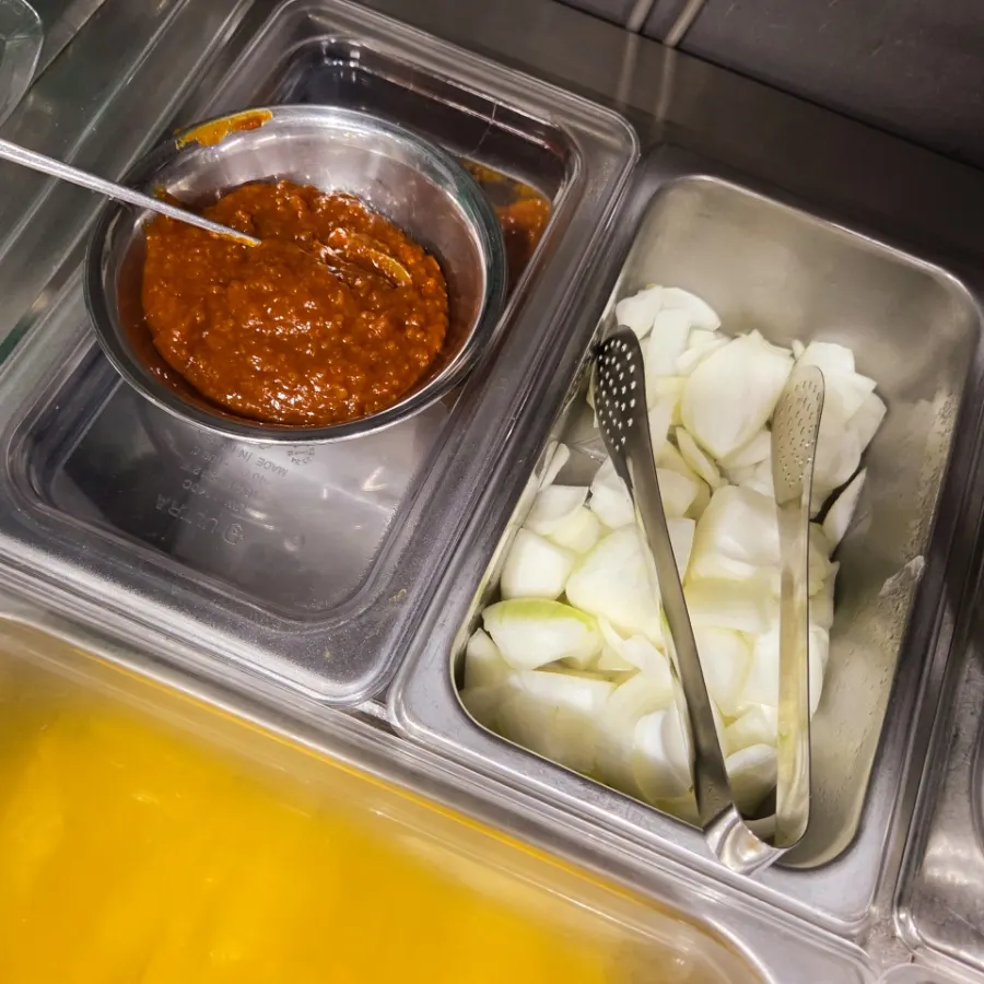 Self-serve bar with raw onions and ssamjang