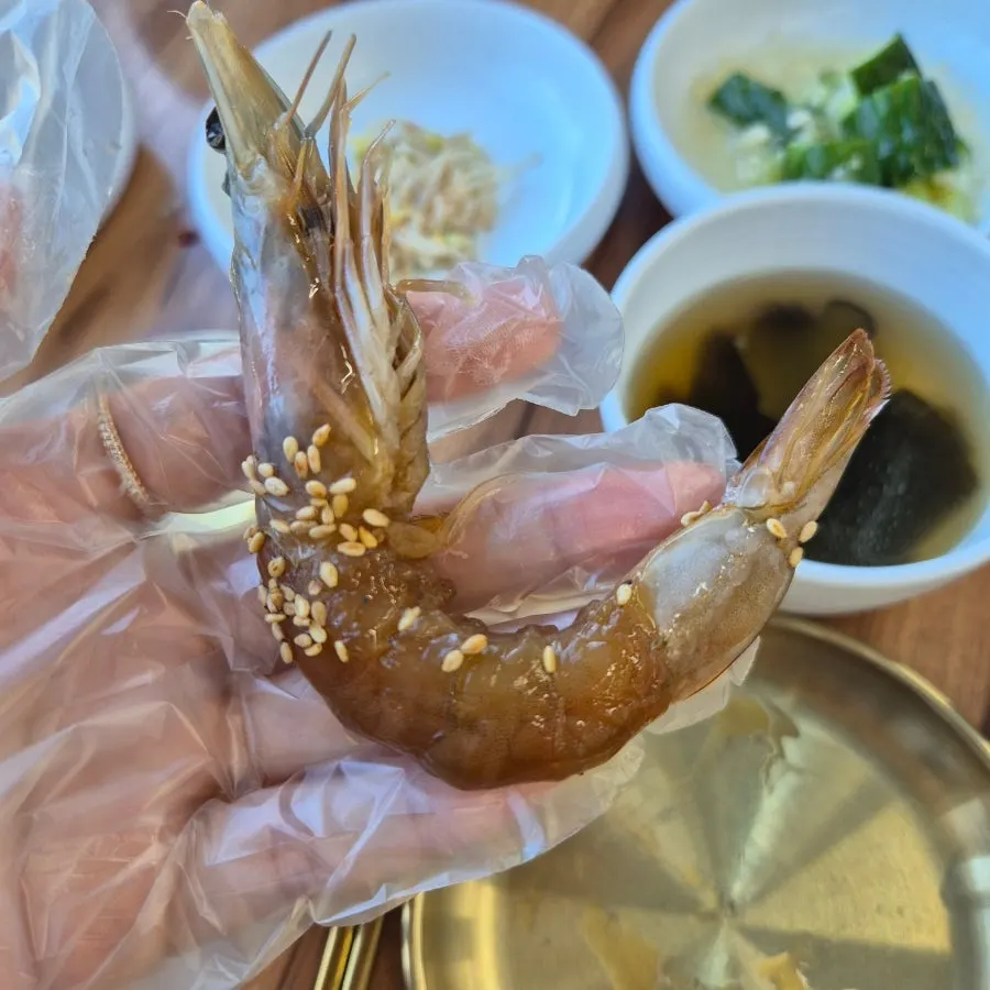 Plate of soy-marinated shrimp jang and abalone jang