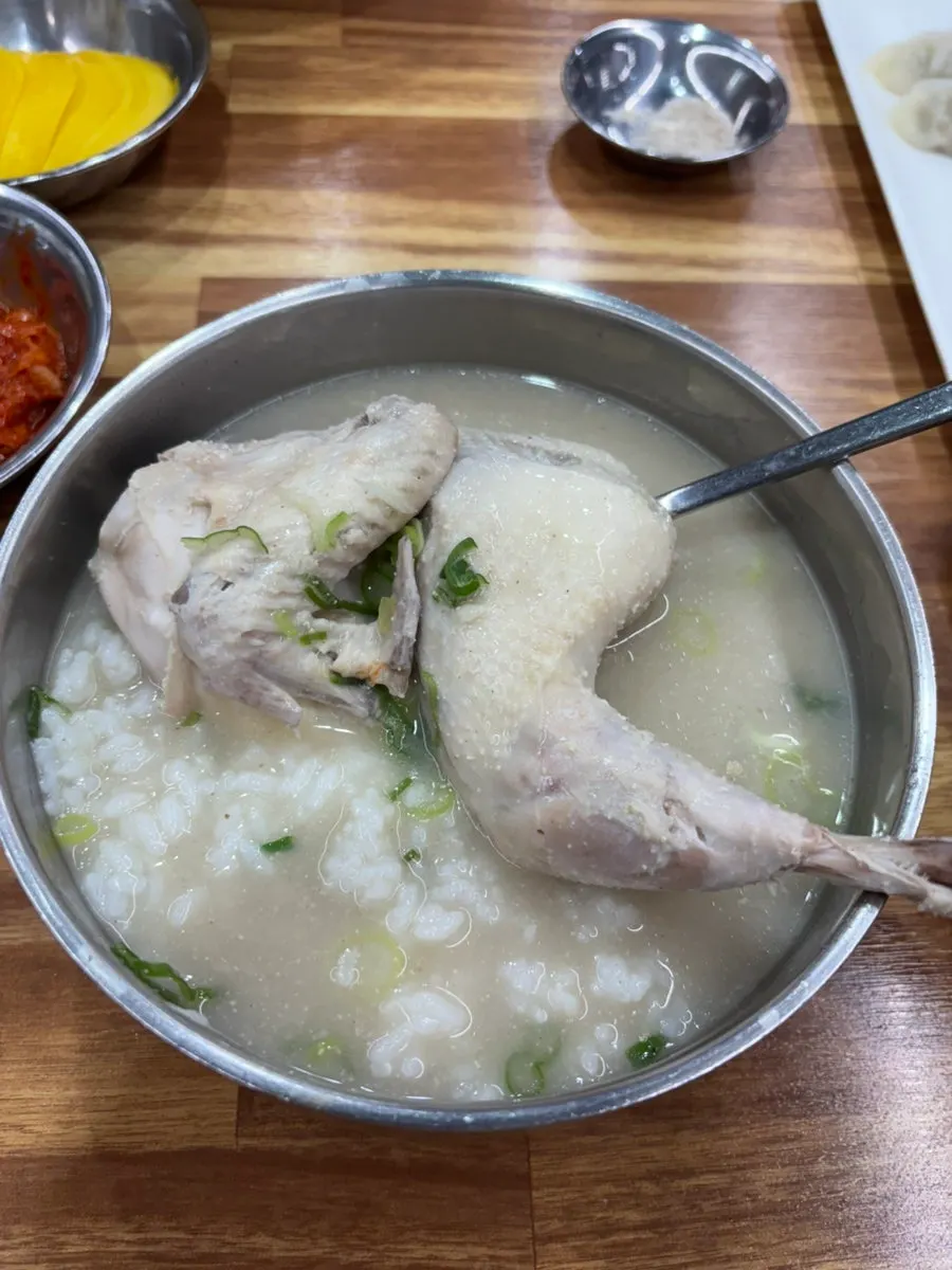 Chicken gomtang served with kimchi