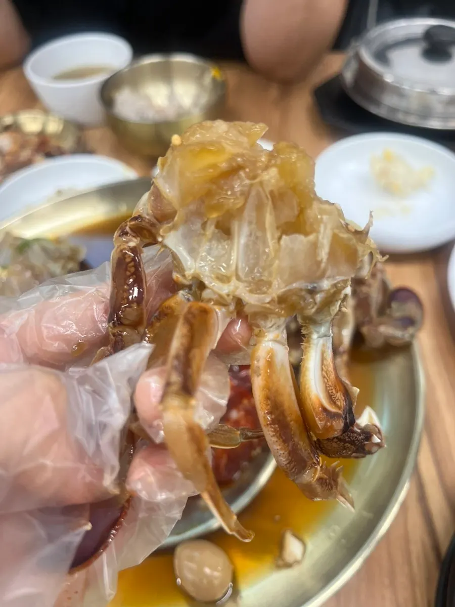 Marinated crab served with a bowl of rice