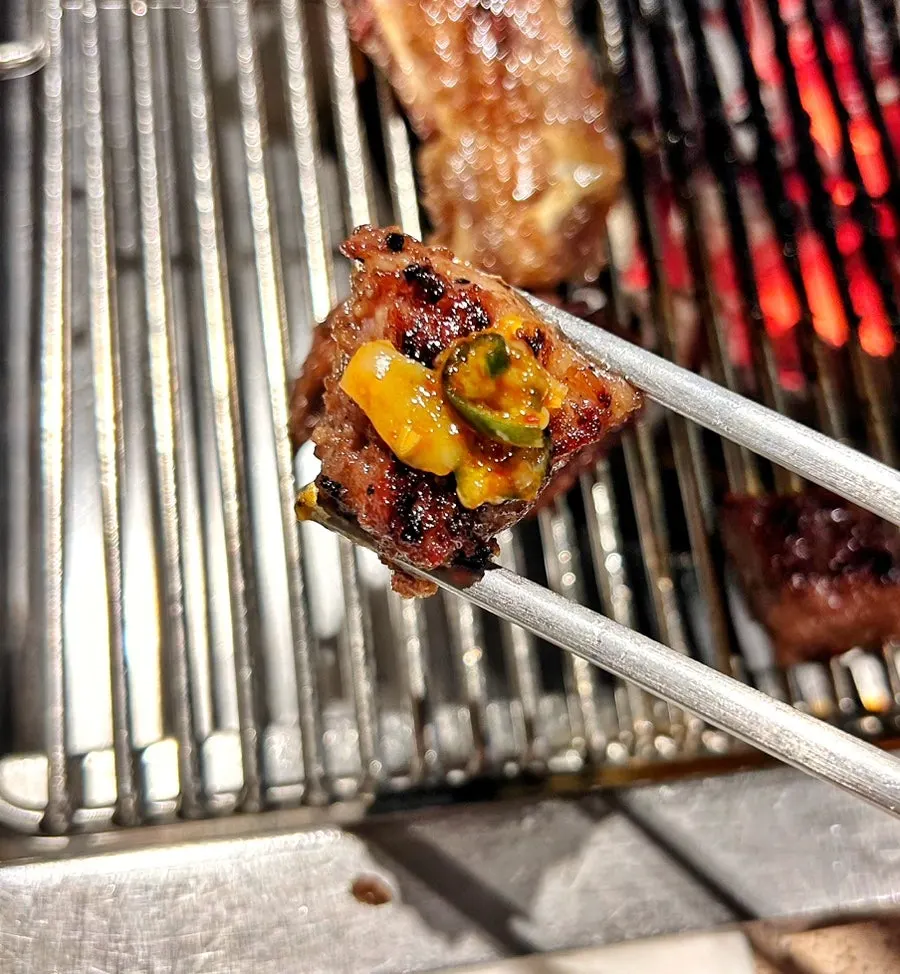 Marinated beef ribs with a charcoal aroma