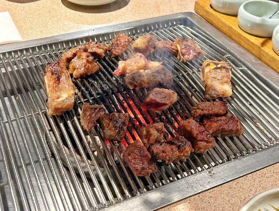 Beef ribs enjoyed with a variety of sauces