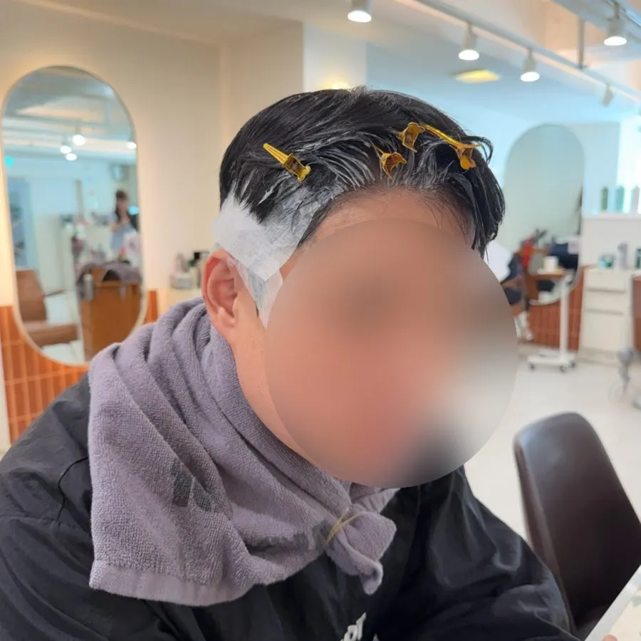 Down perm solution applied to the sides