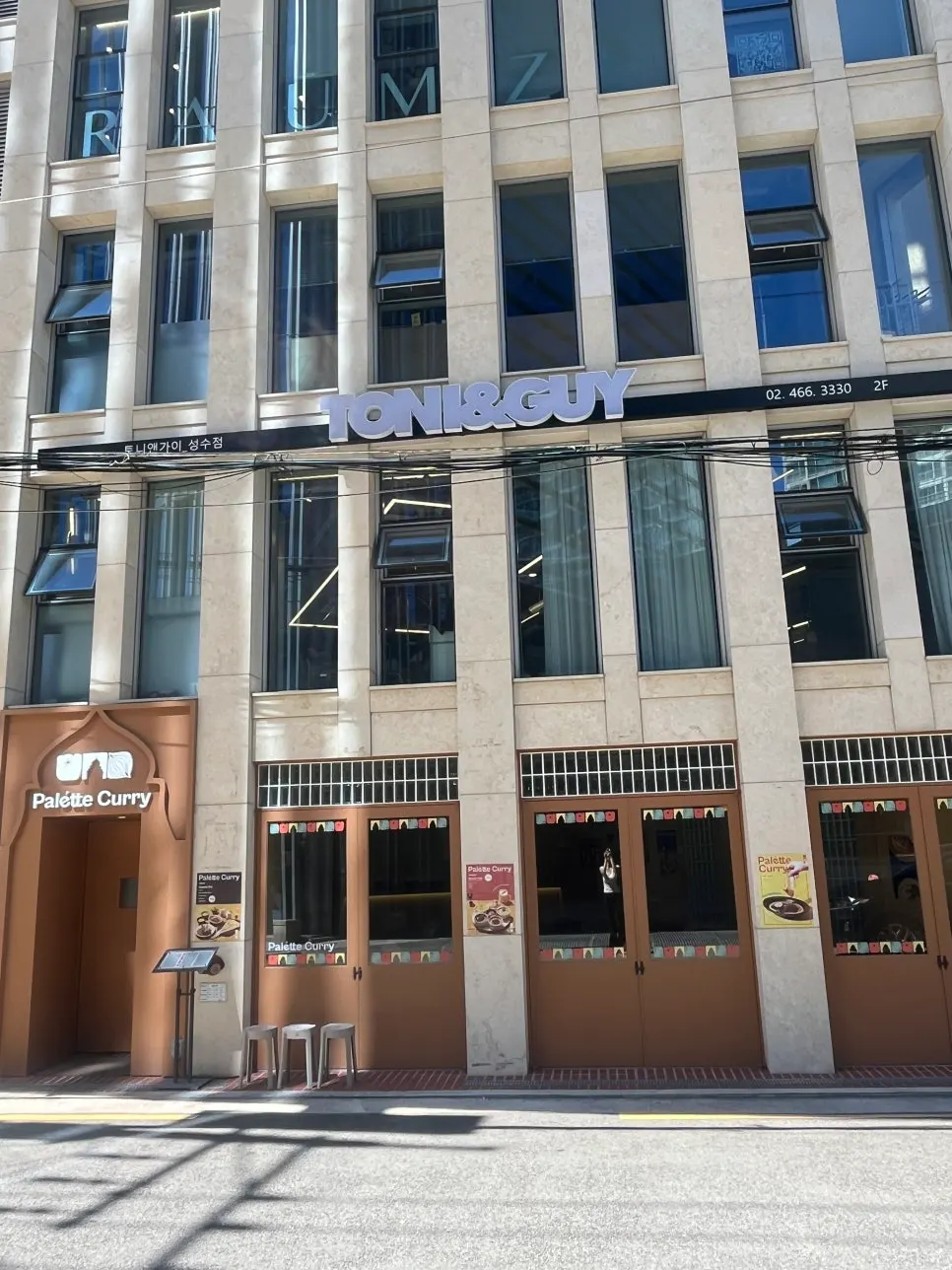 The ivory-colored building housing Toni&Guy Seongsu