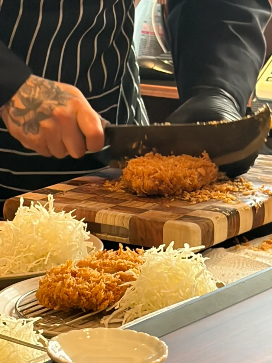 Cooking process visible from the bar table
