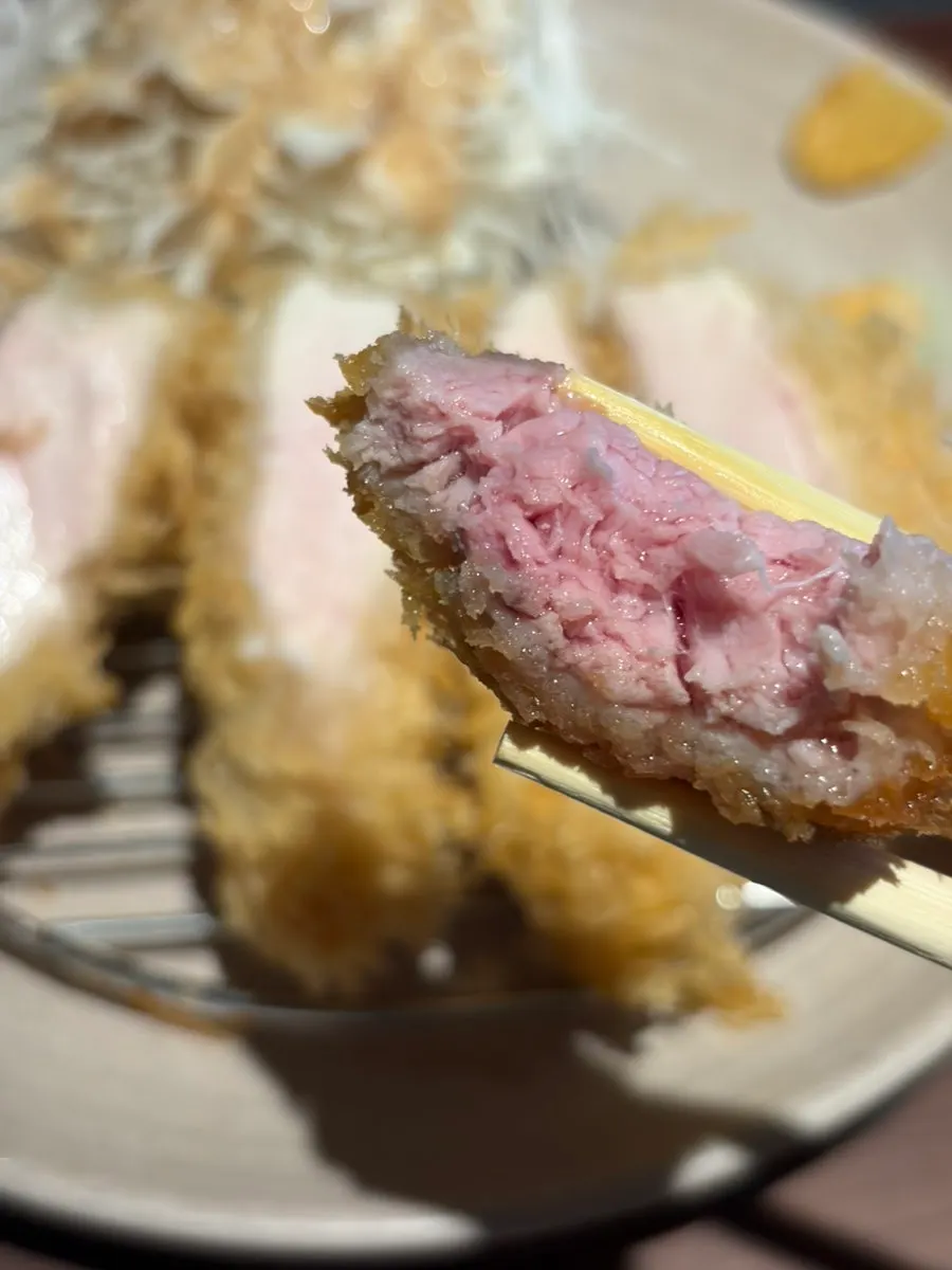 Cross-section of the special loin katsu showing distinct fat layers