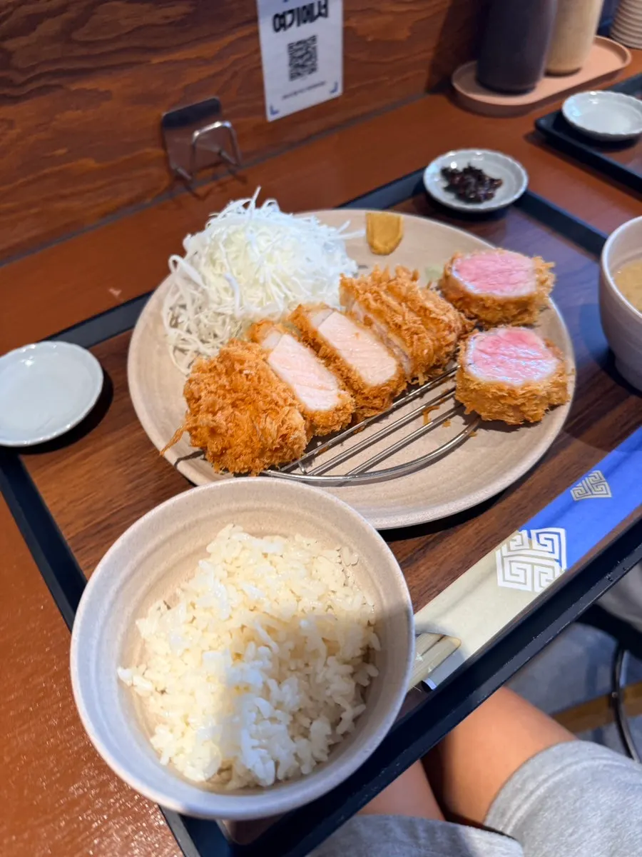 A golden-fried tonkatsu set for two on the table