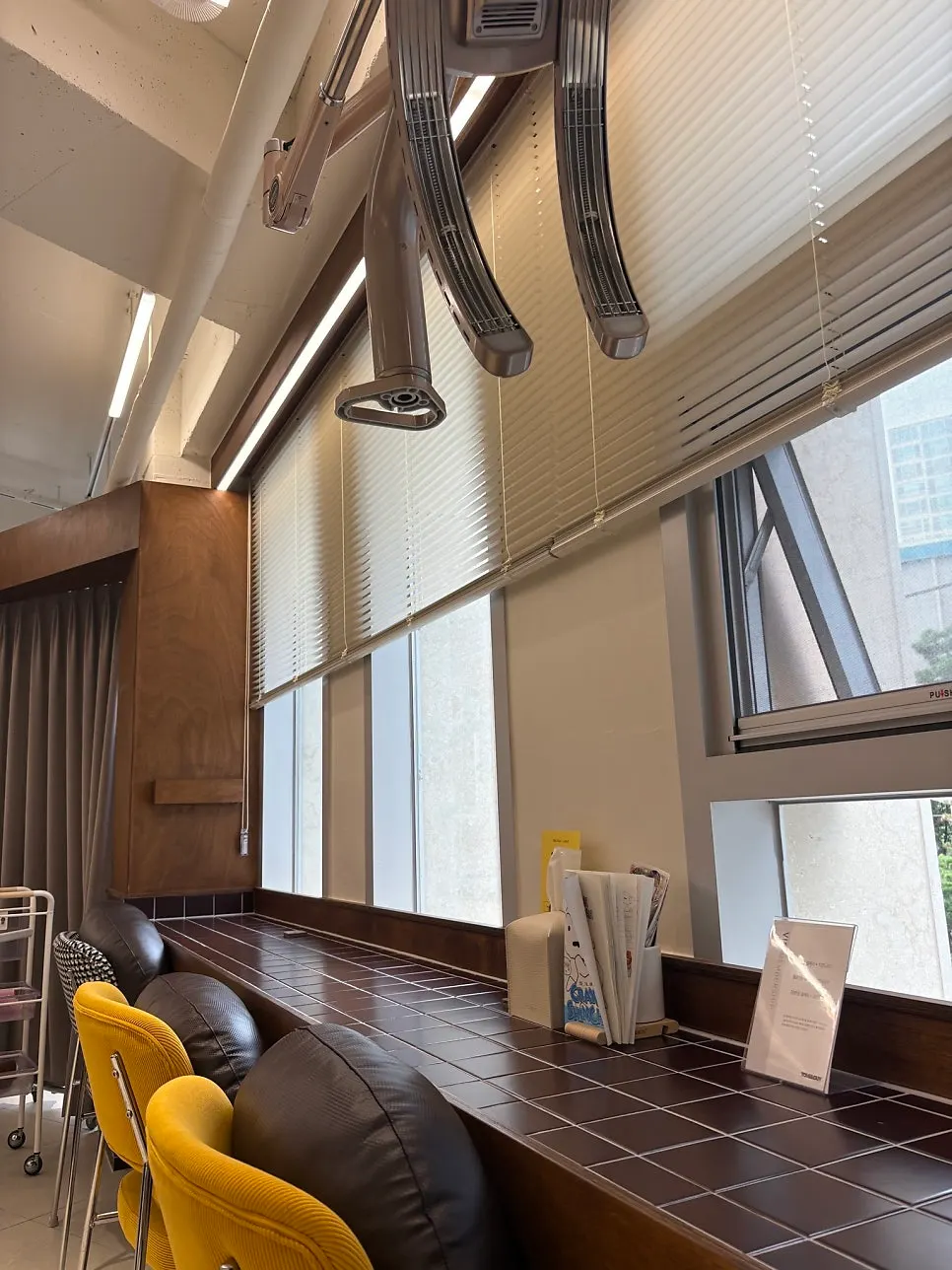 Long table and mirrors lining the window