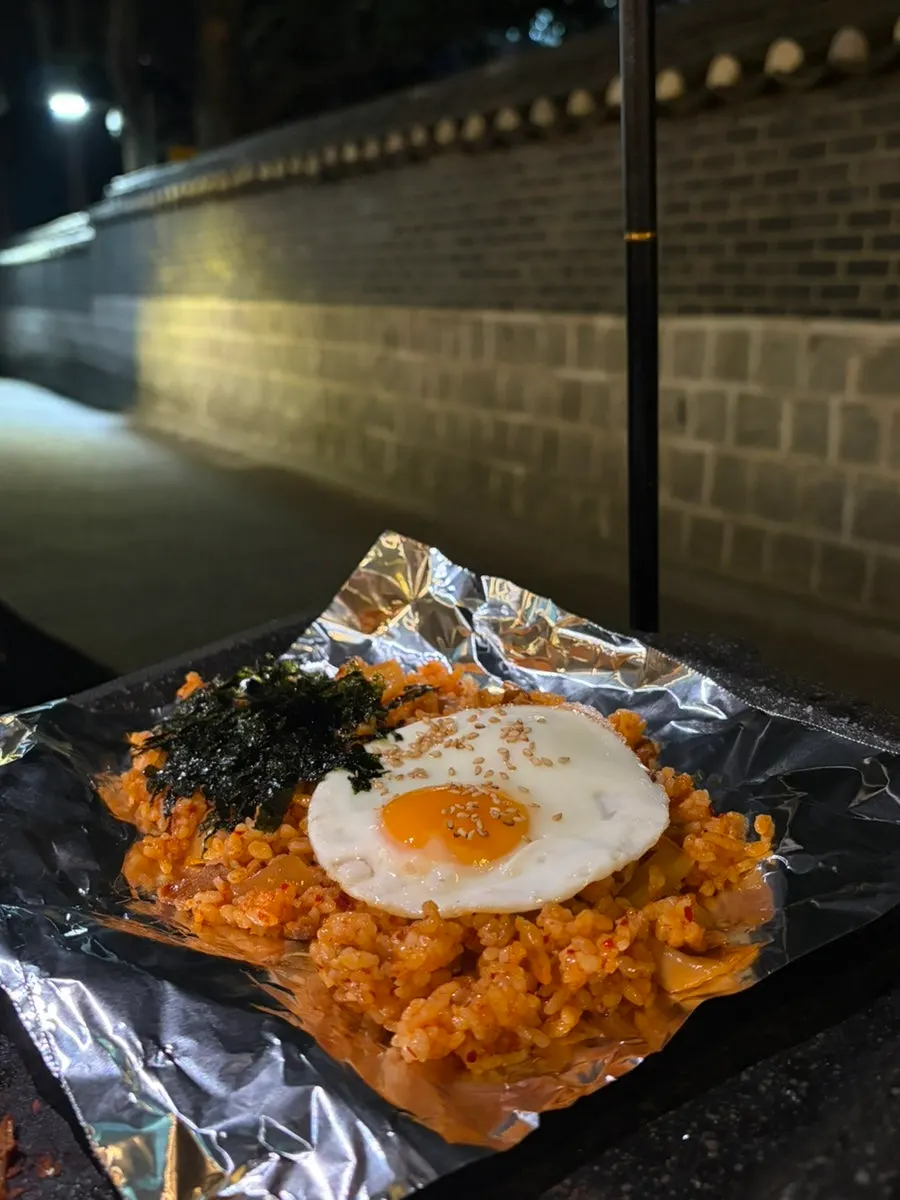 Kimchi fried rice topped with grilled kimchi