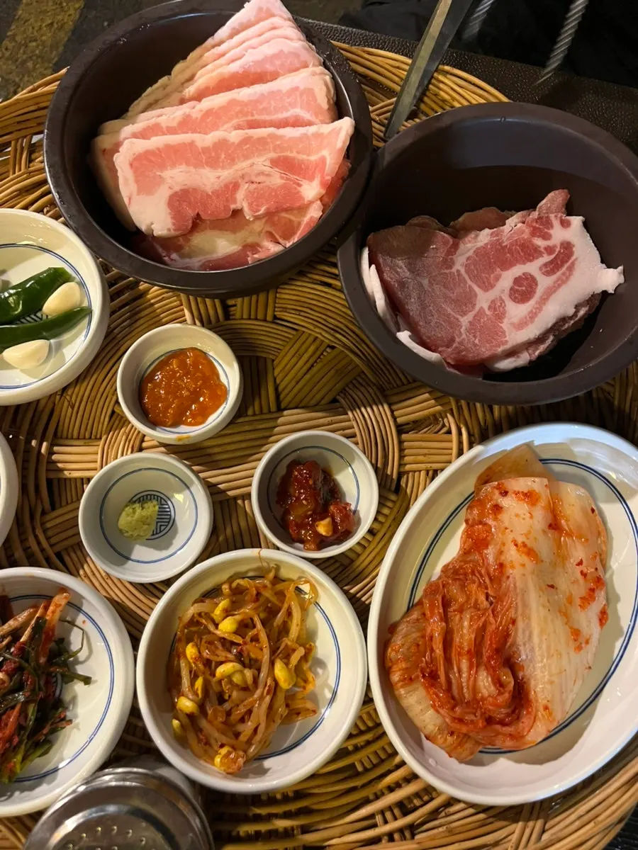 Frozen pork belly on the grill