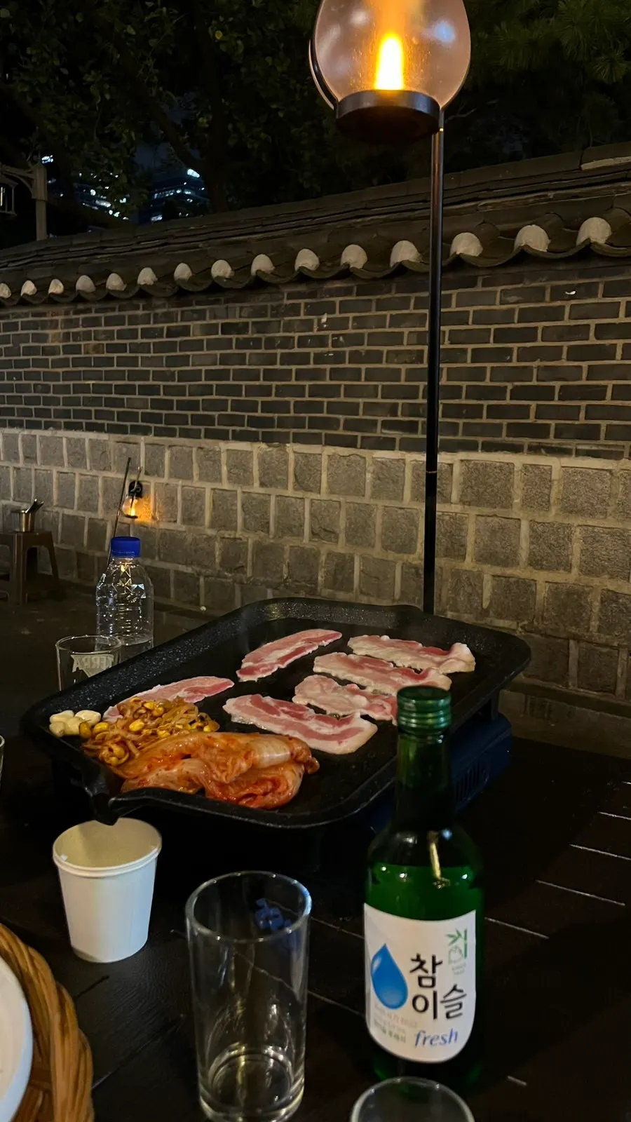 Kimchi and bean sprouts grilling together on the pan