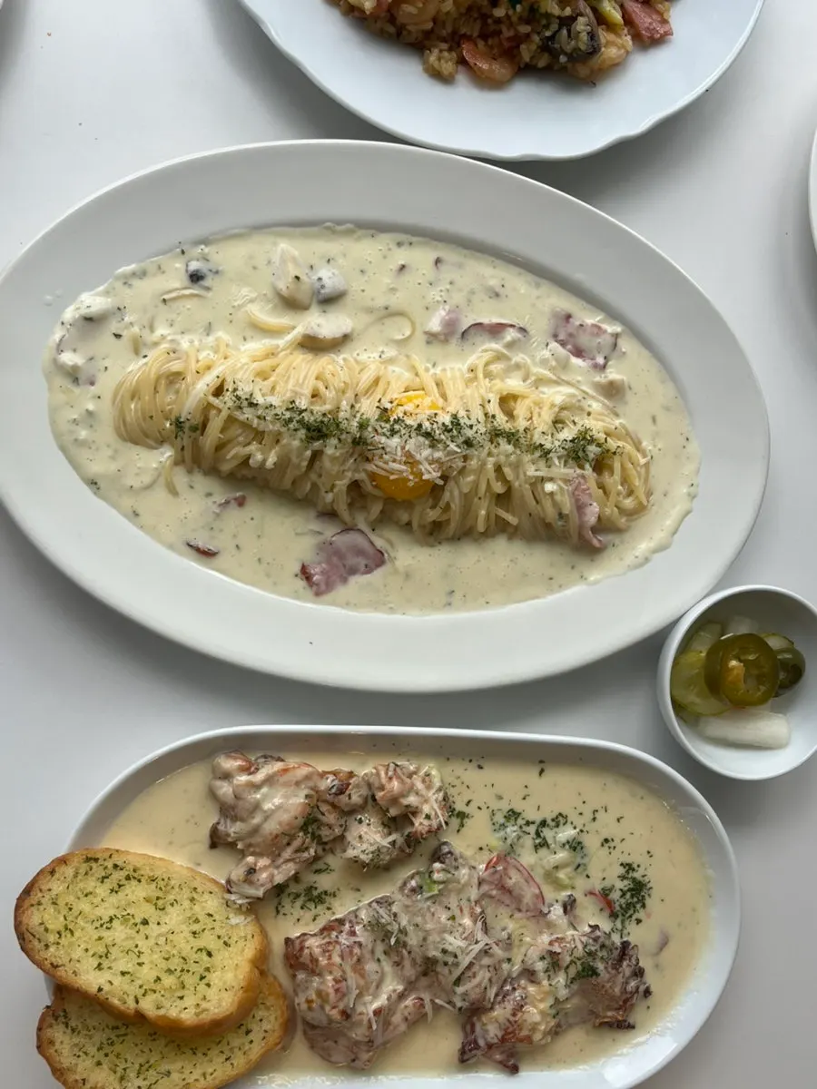 Chicken thigh steak topped with cream sauce