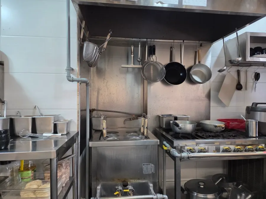 Torikokoro's open kitchen with visible cooking process