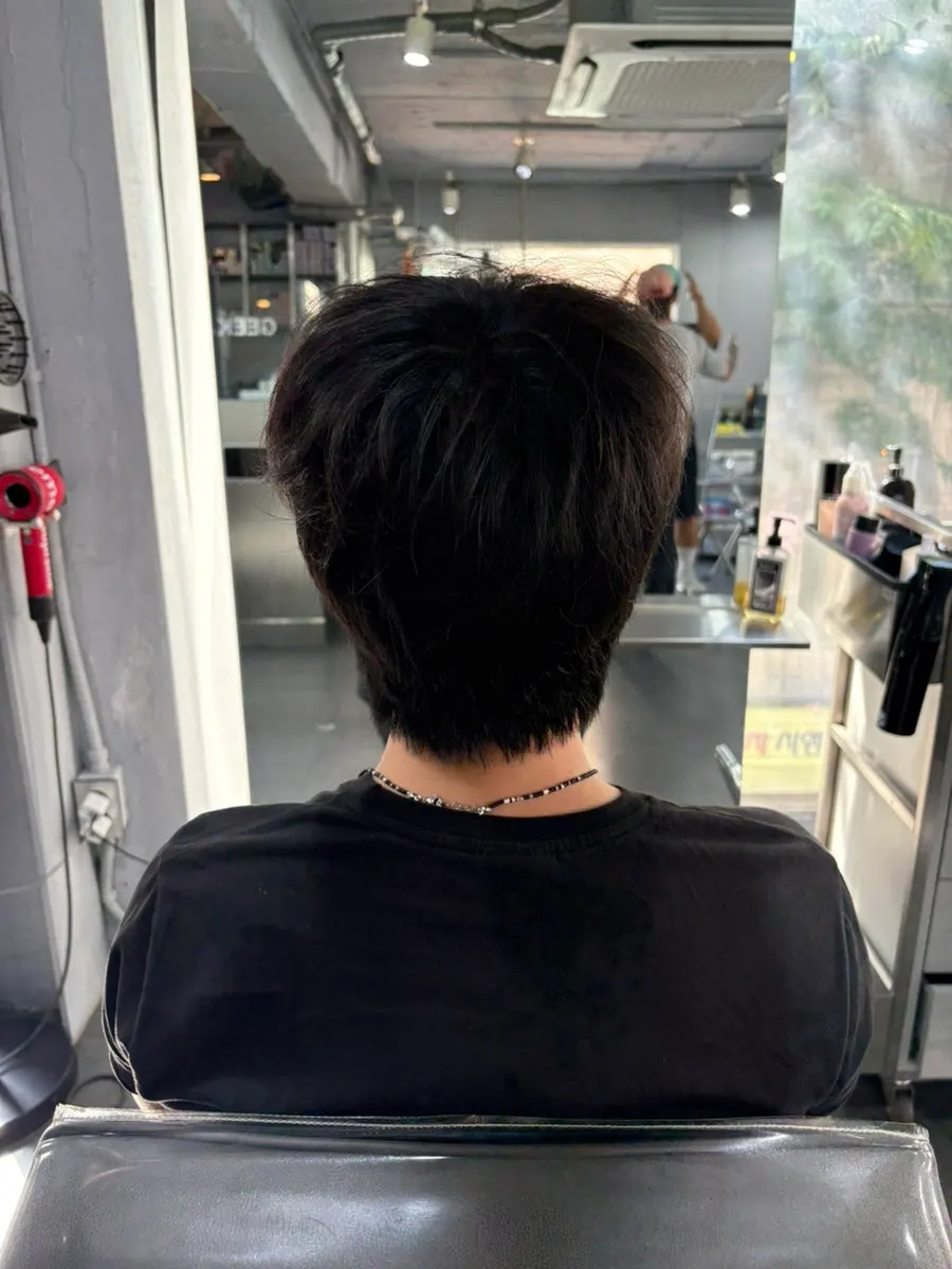 Frizzy wavy hair before the down perm