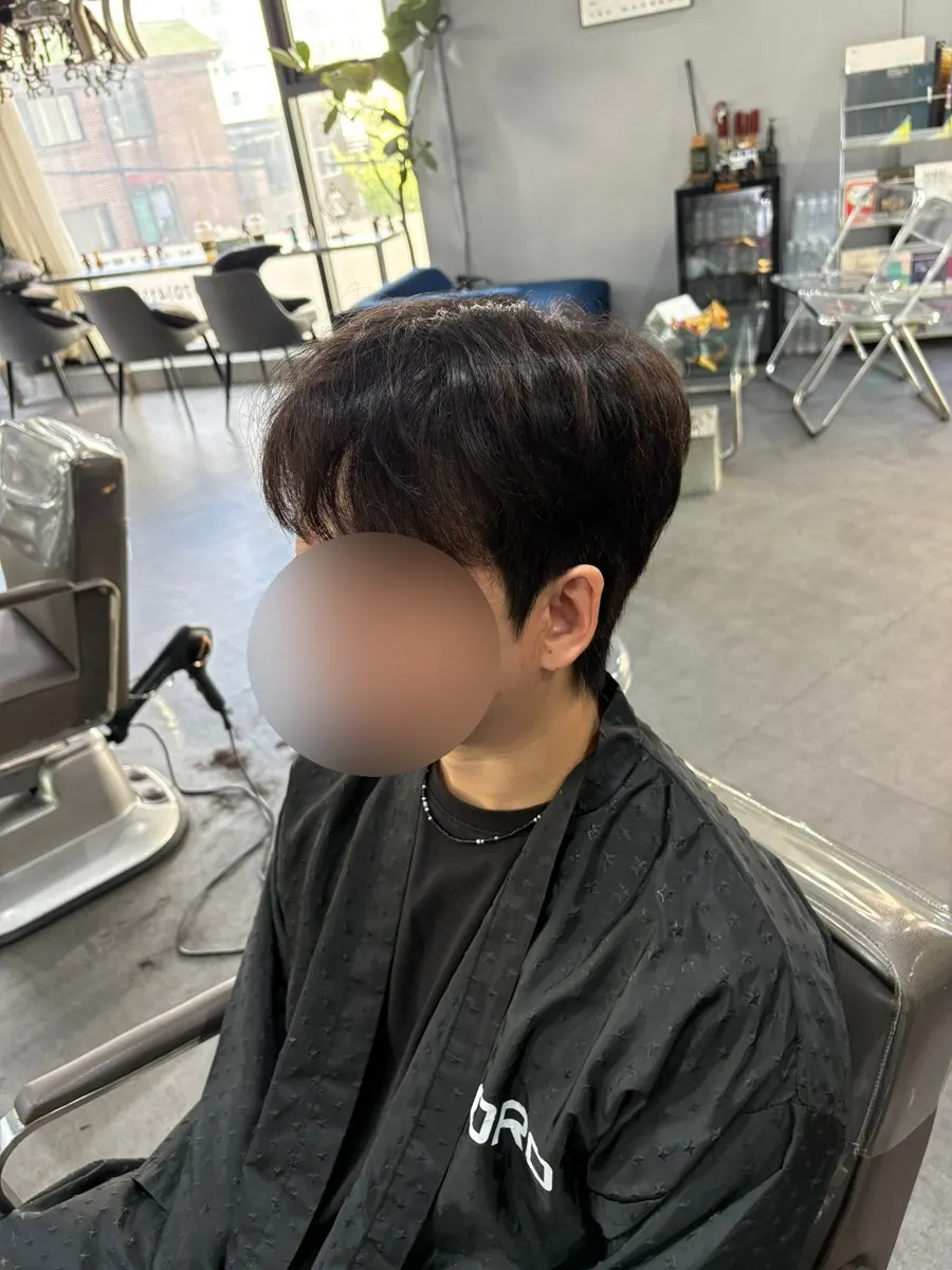Neat front view after the cut and down perm
