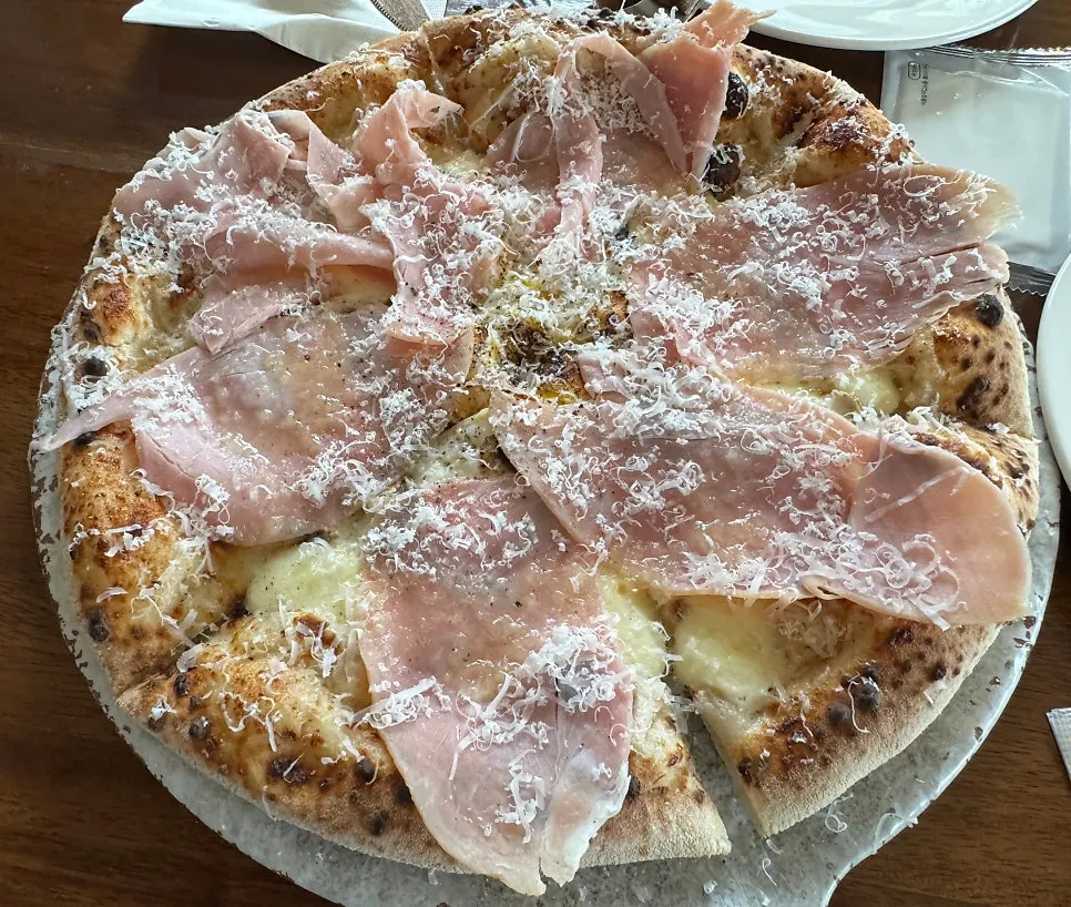 Whole wood-fired Bismarck pizza