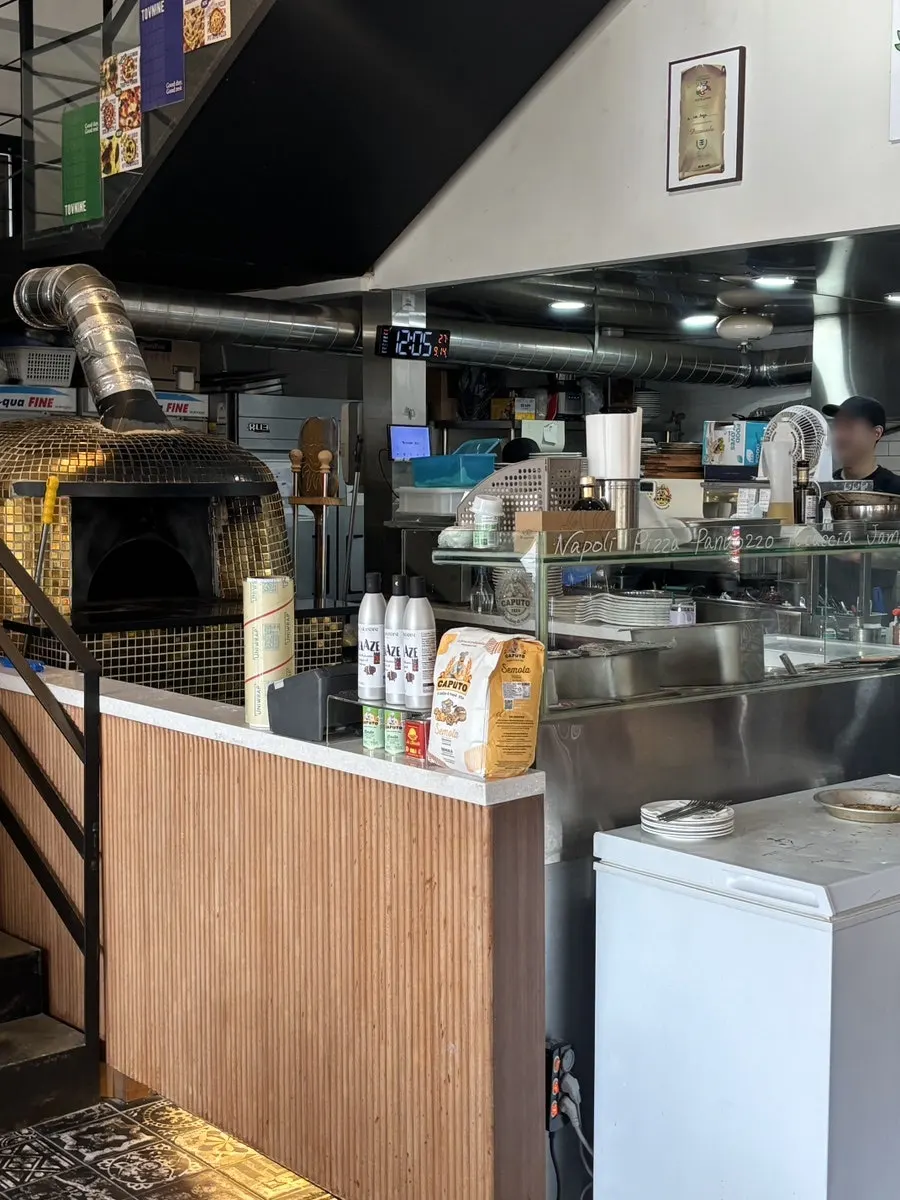Wood-fired kitchen with Caputo flour on display