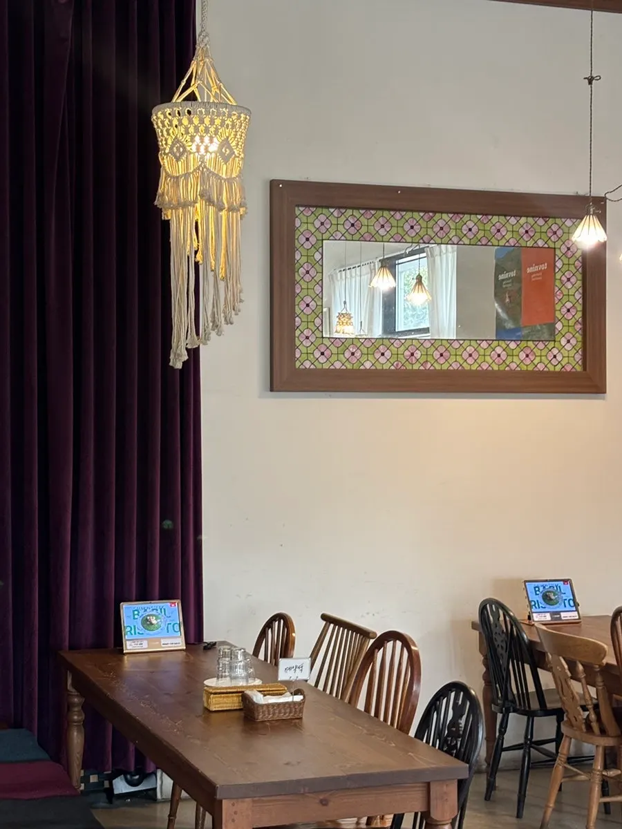 Fully booked first-floor seating on a weekday lunch