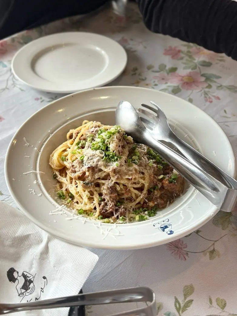 A bowl of truffle white ragu pasta