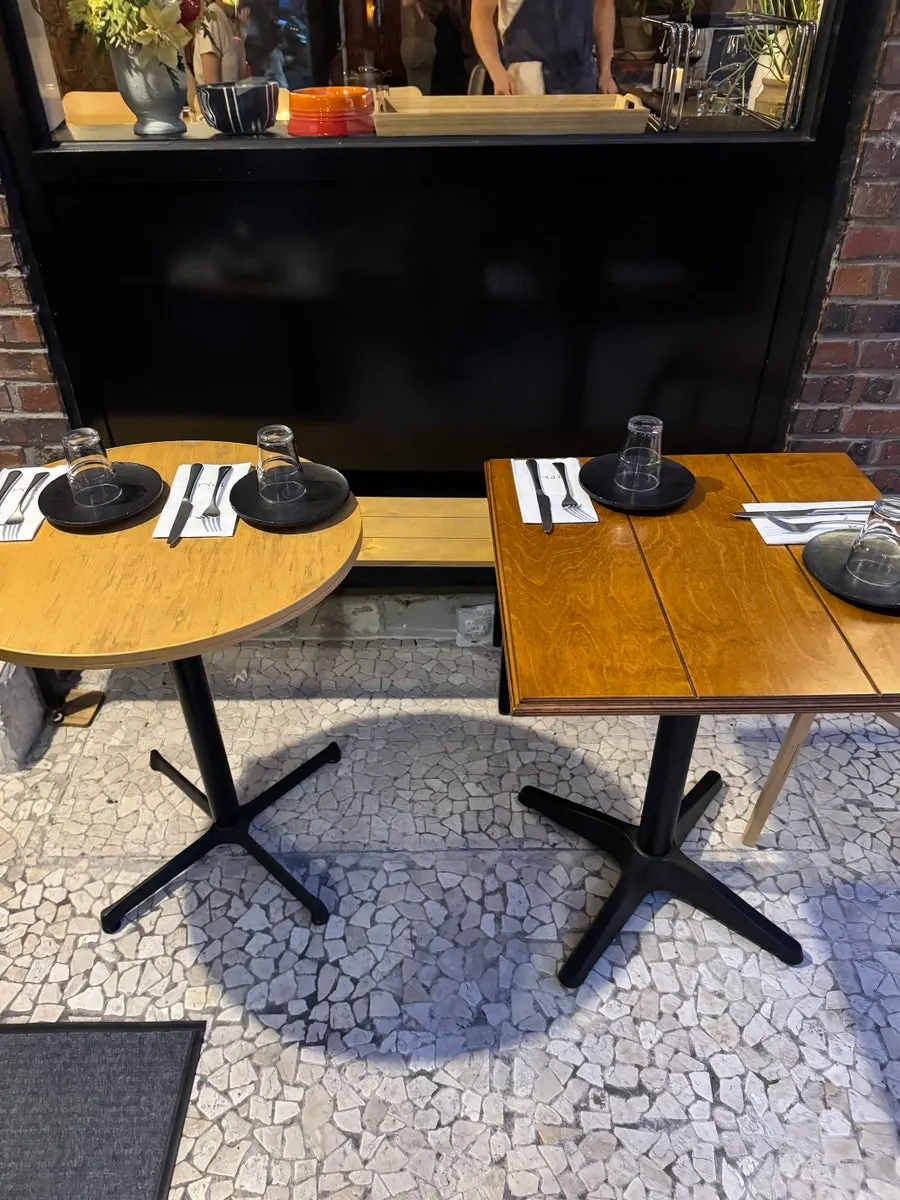 Outdoor terrace tables at TPM hbc