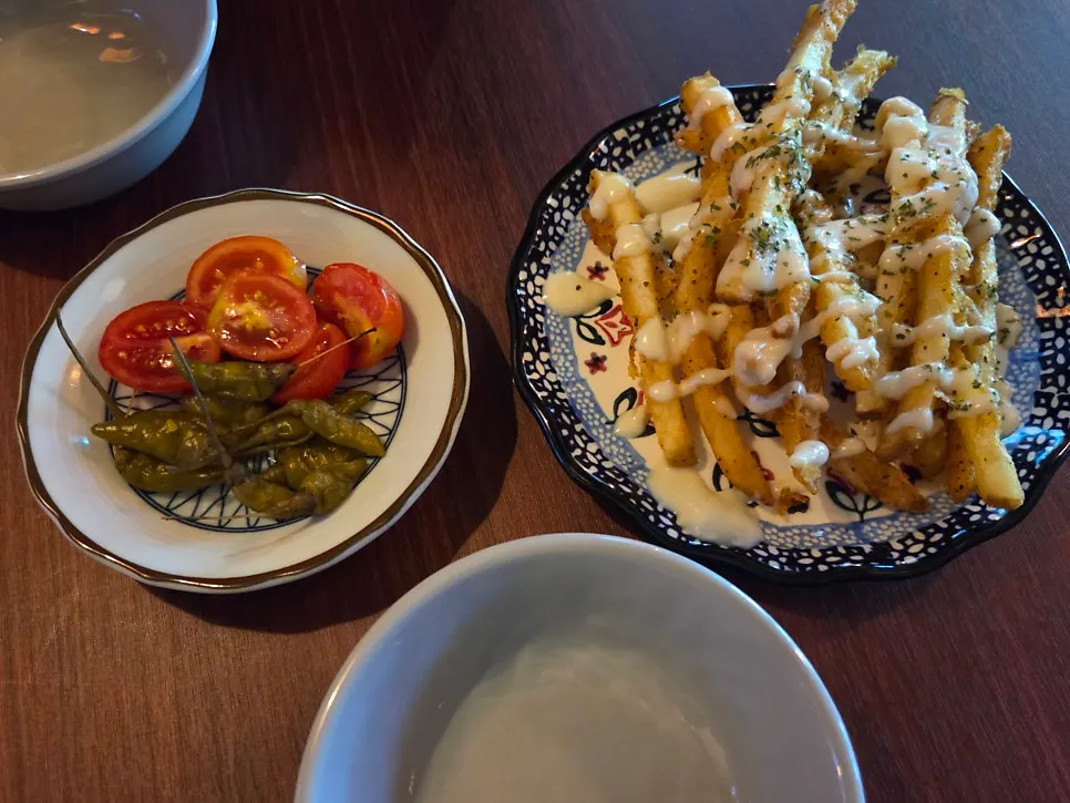 Fried potatoes served as a complimentary starter