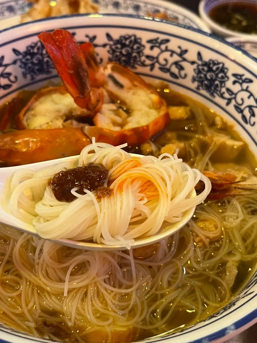 Broth mixed with sambal sauce and chili oil