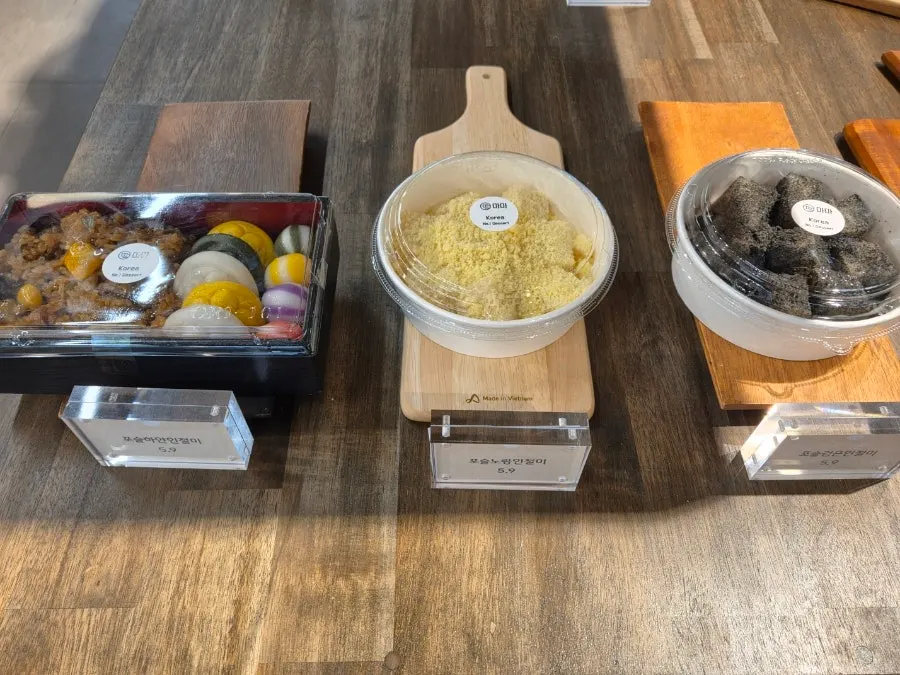 Various types of rice cakes displayed on shelves