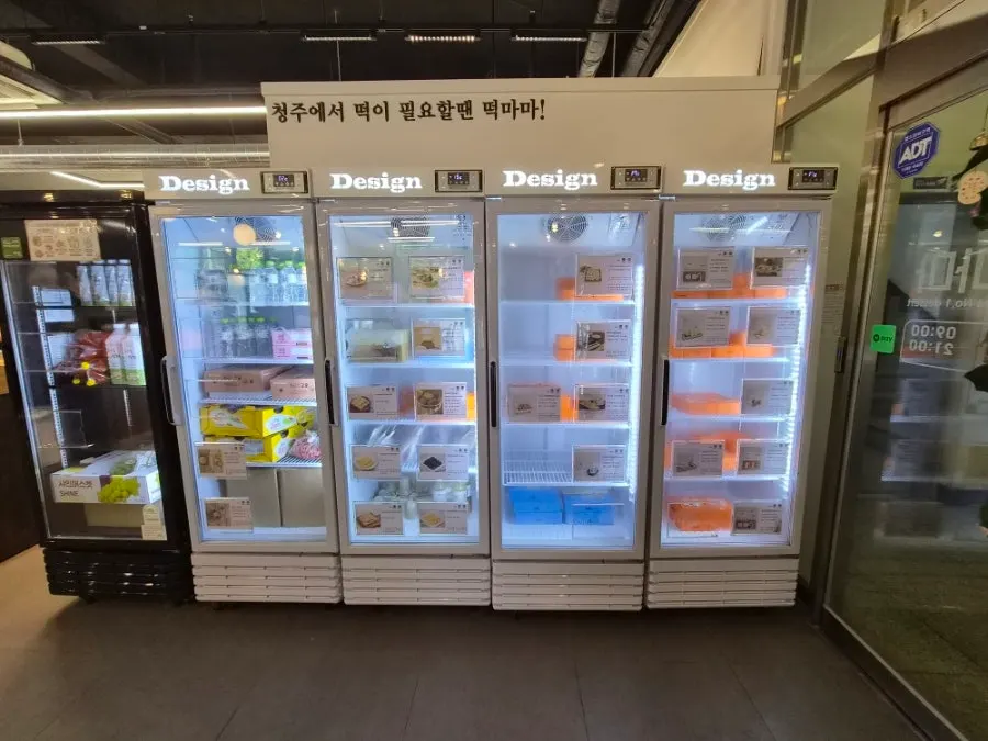 Red bean fruit chapssaltteok displayed in a refrigerated case