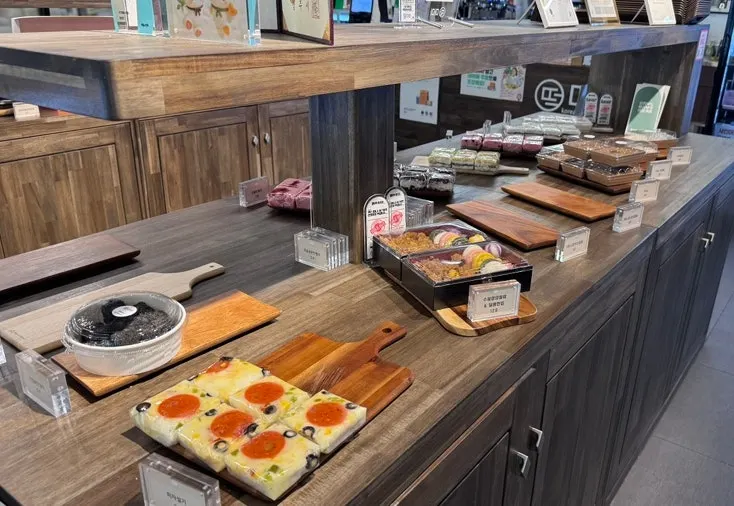Interior with rice cake display case in view