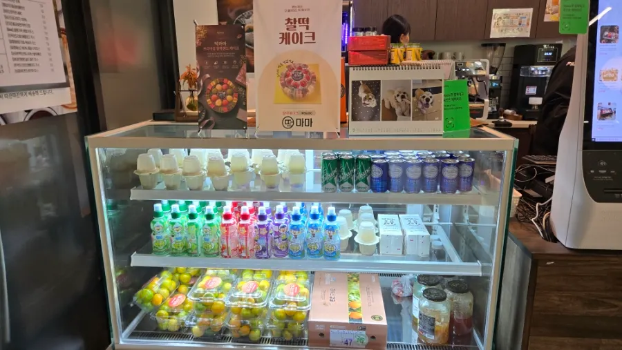Drink menu listing coffee, sikhye and fresh fruit juice