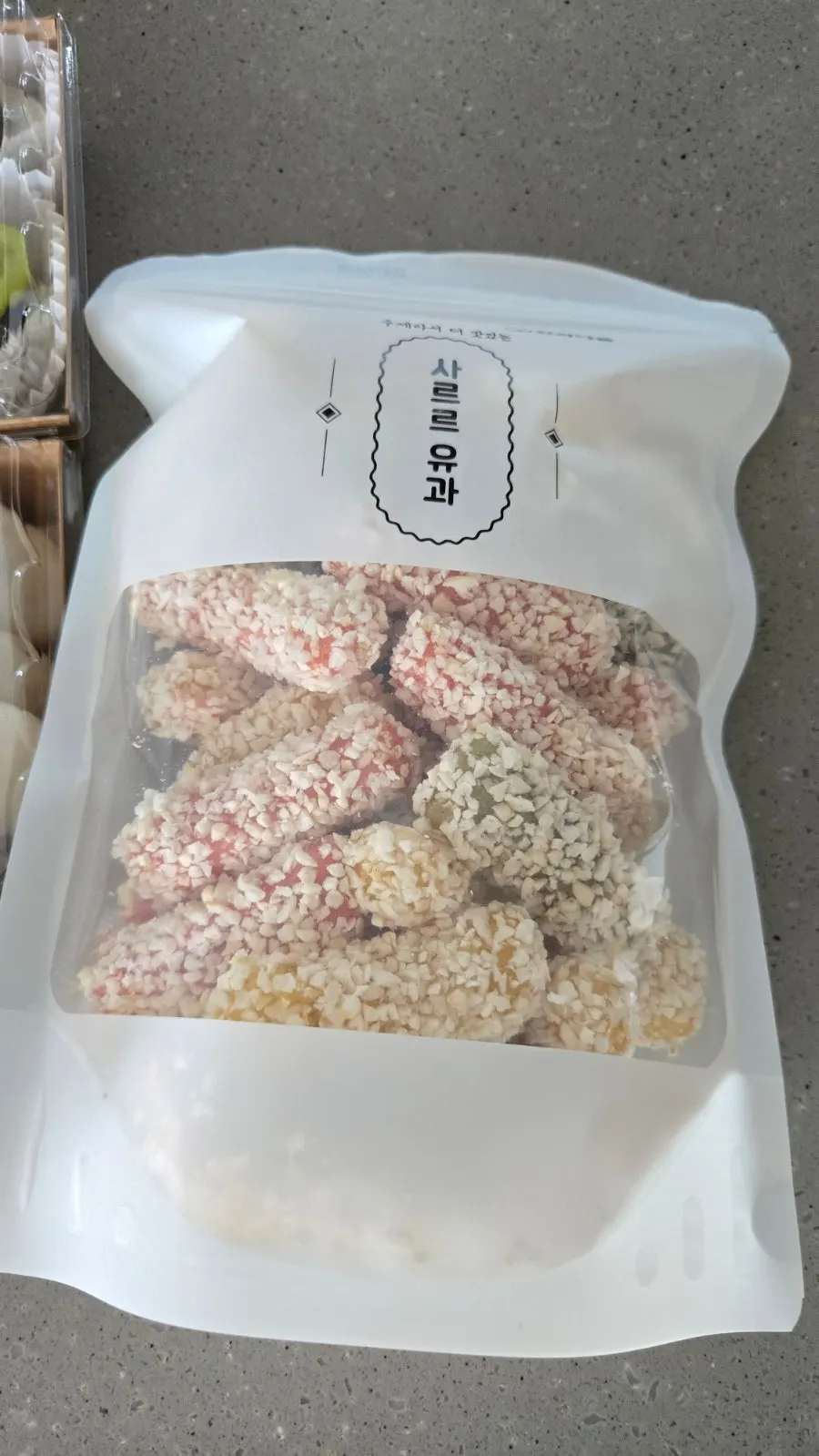 A slice of pizza seolgi piled generously with toppings