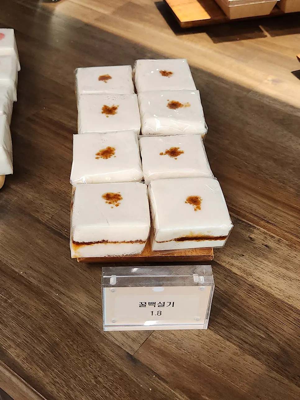 Mini chocolate injeolmi displayed in cups