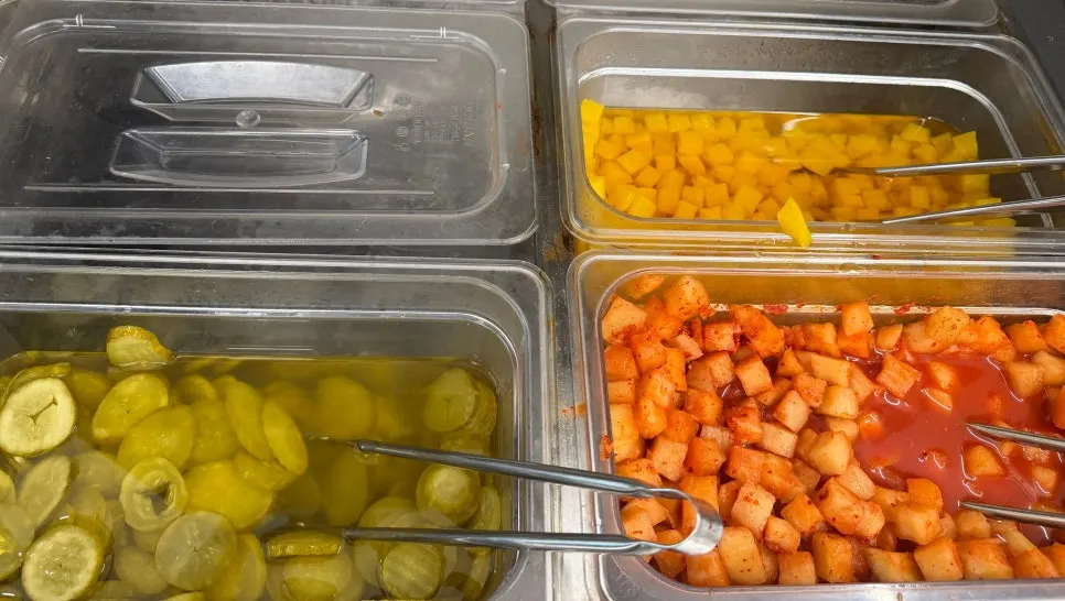 Self-bar with tteokbokki, pickles, and danmuji